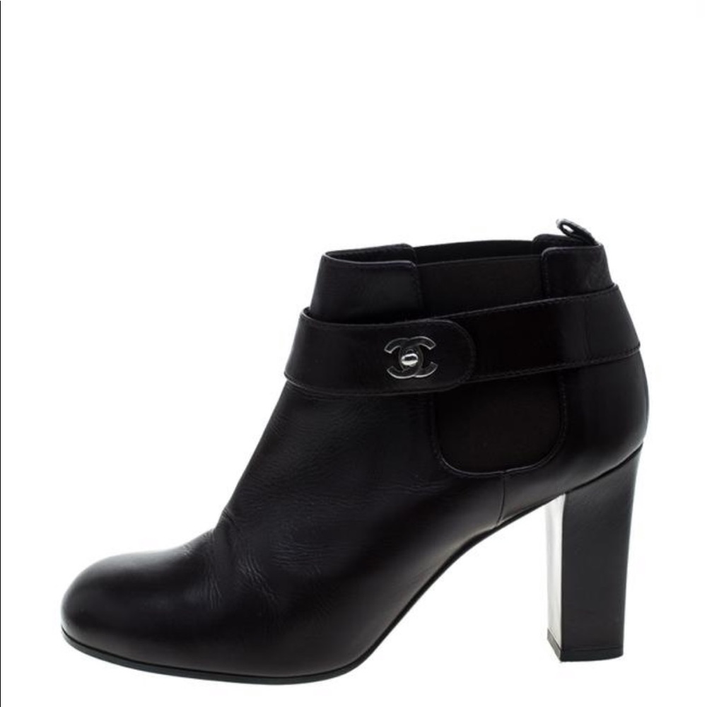 Authentic Chanel Black Bootie silver CC clasp.